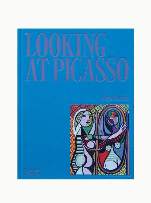 A blue book cover titled "Looking at Picasso" by Pepe Karmel, featuring an abstract artwork with two figures and a vibrant, geometric background.