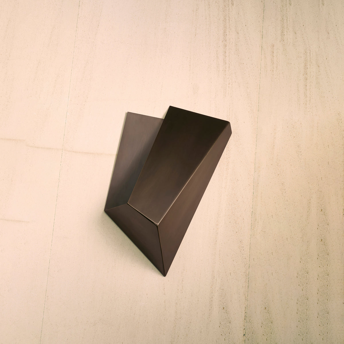 Katoptris Bronze Wall Light — top view of angular bronze design