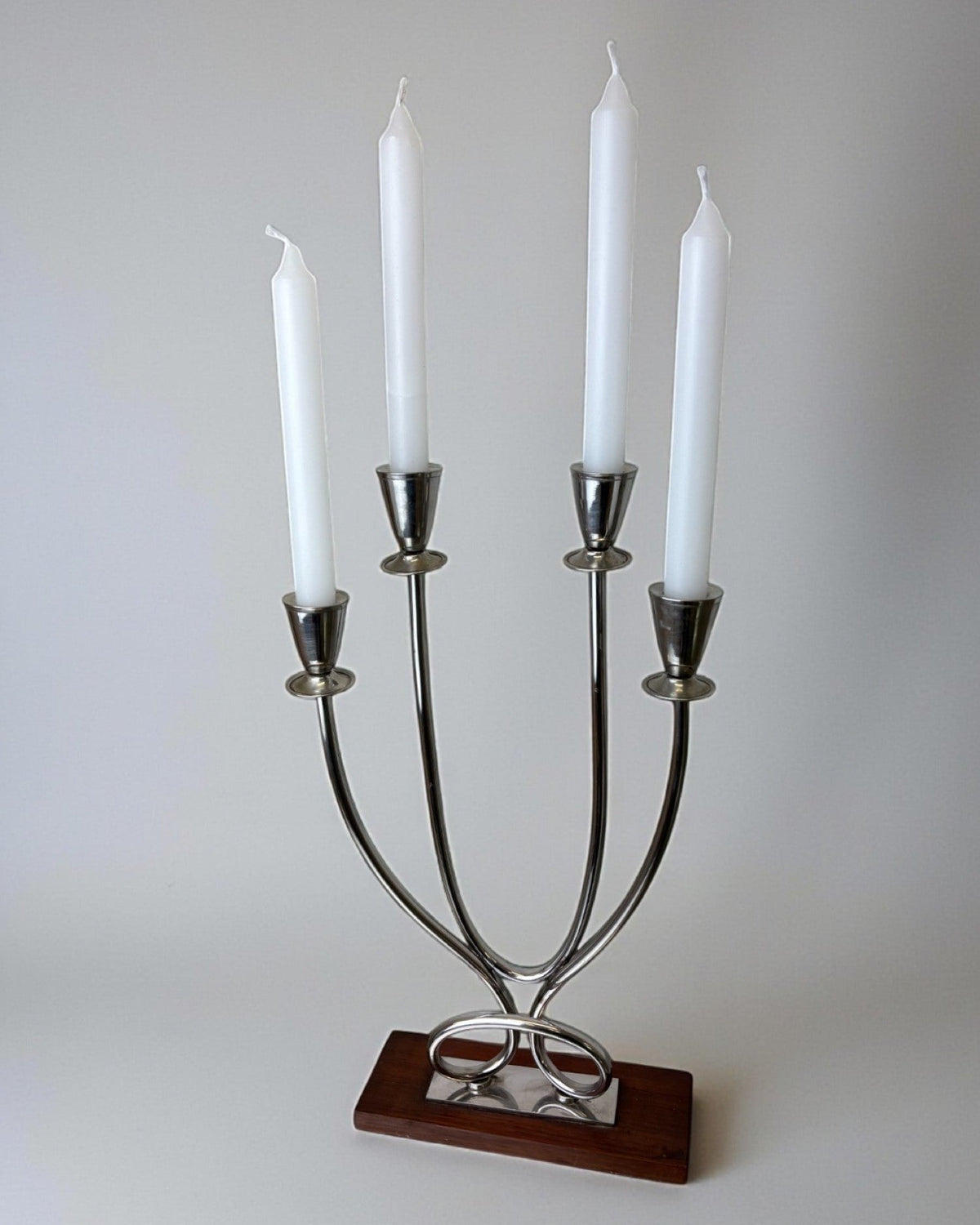 Art deco candlestick in stainless steel and rosewood, 4 flames, Spain, 1970's by Malamar Studio | The Oblist