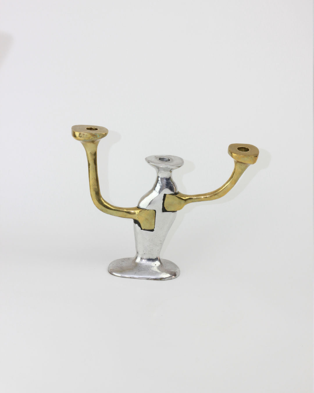 Brutalist three-arm brass and chrome candleholder from 1970s
