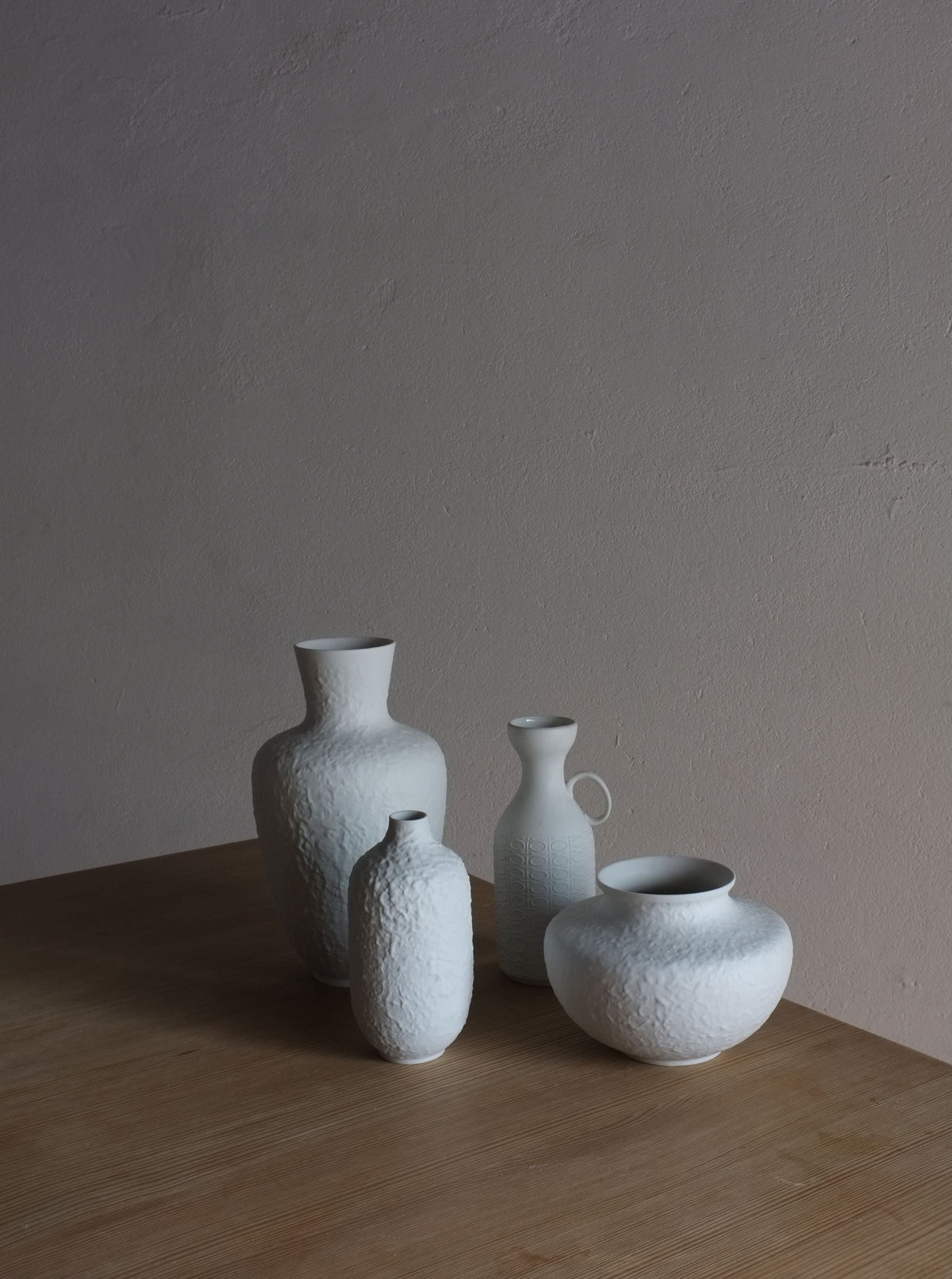 4 White Biscuit Porcelain Vases from West Germany, dating back to the 1960s