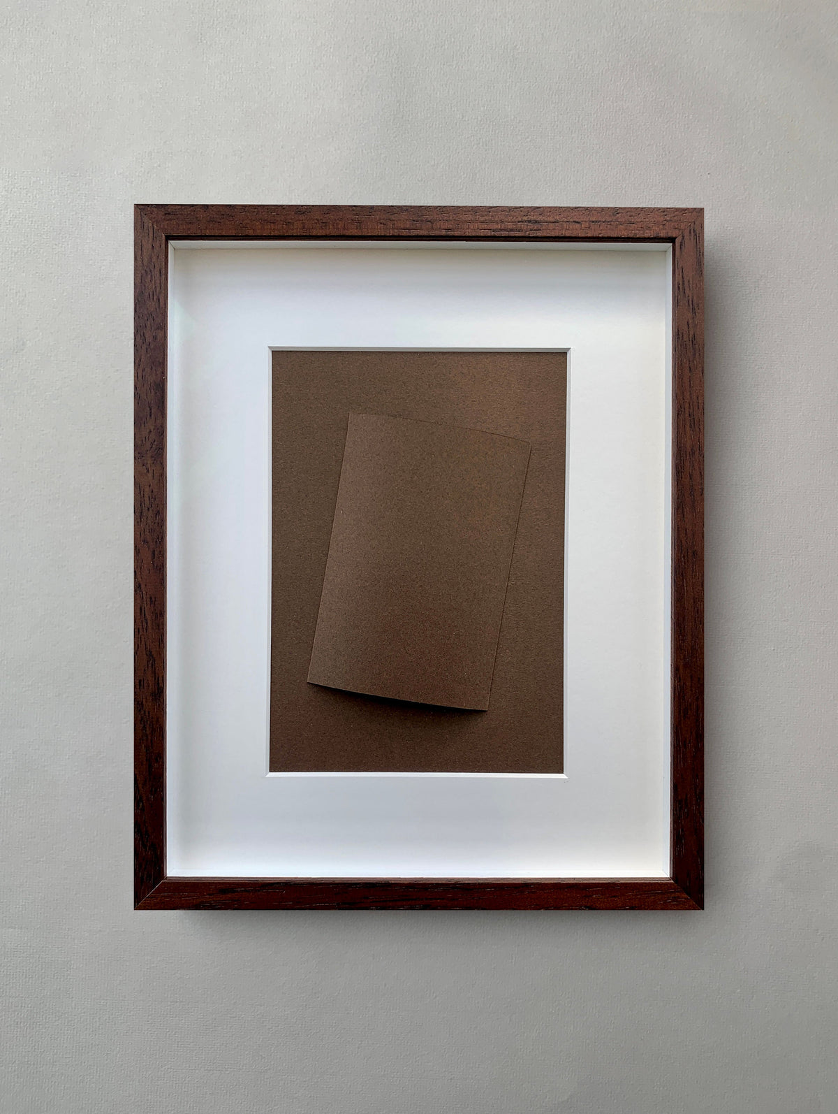 Framed brown paper fold artwork by Marie Pomme Adriaansen