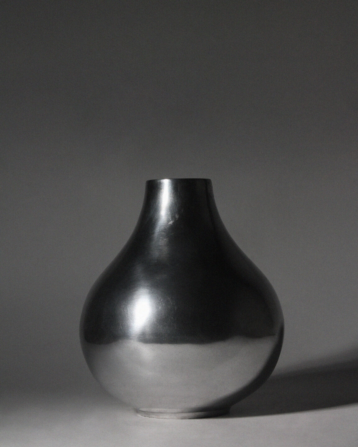 Polished Aluminum Bulbous Vase — detail view