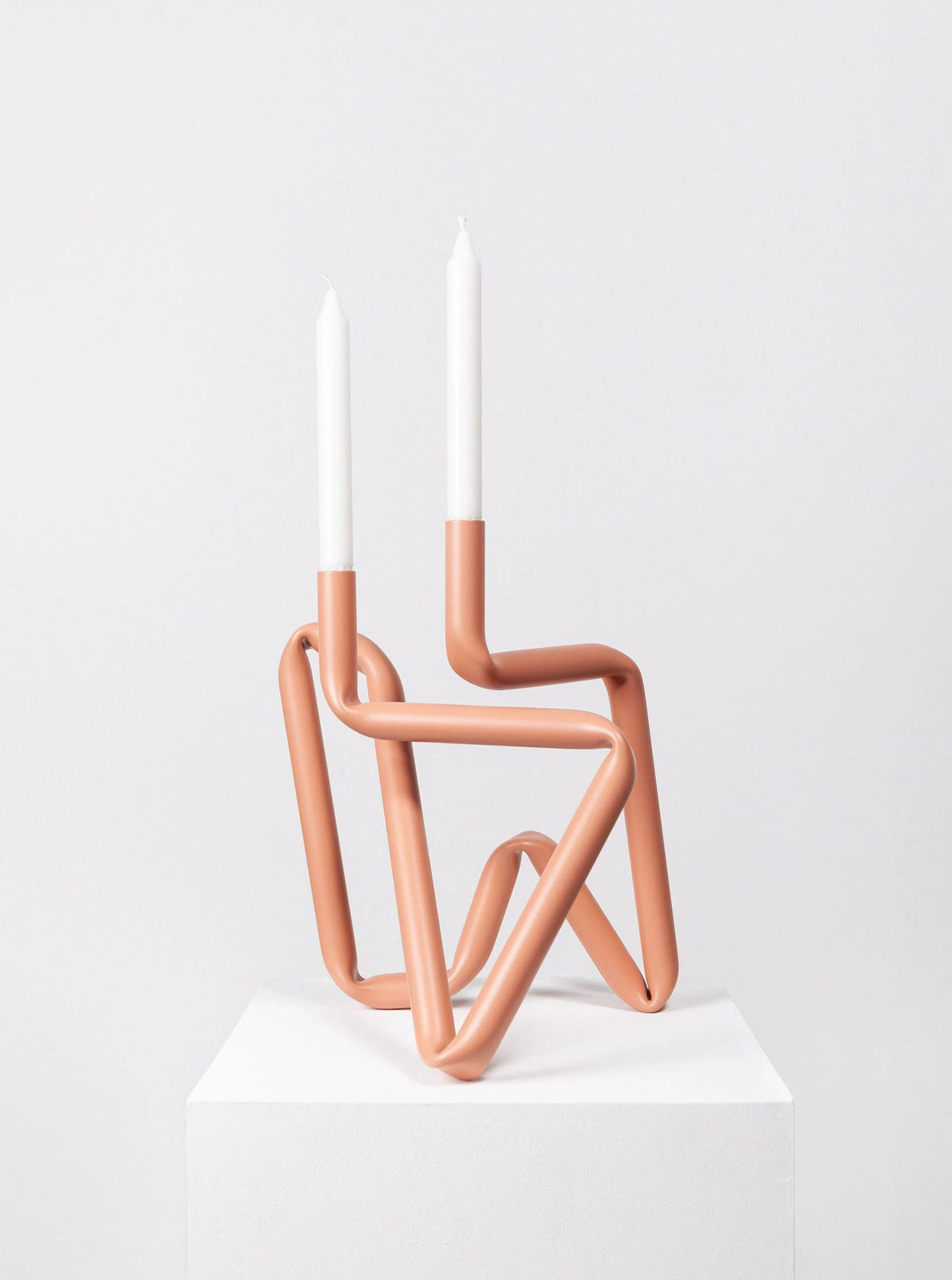 Bucati Candle Holder (Red) designed with intricate floral patterns and metallic finish