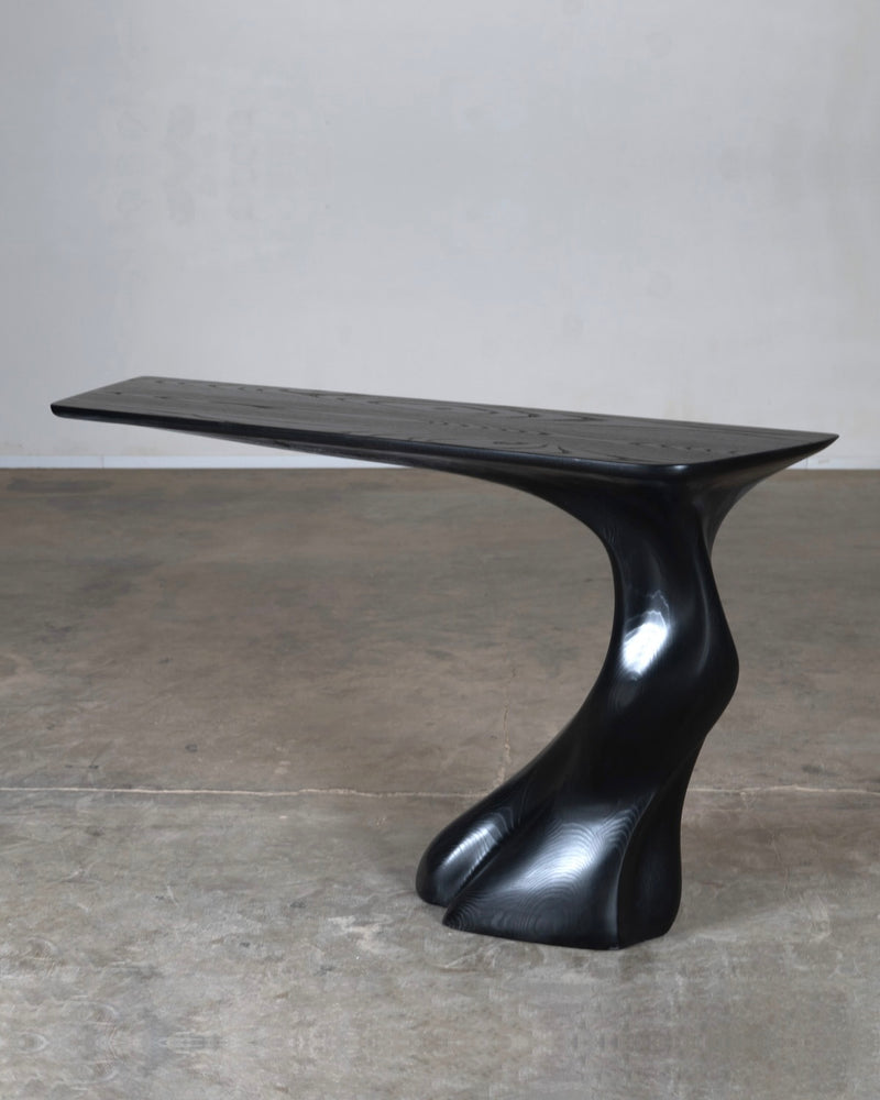 Sculptural Frolic ash wood console table by Amorph, black finish
