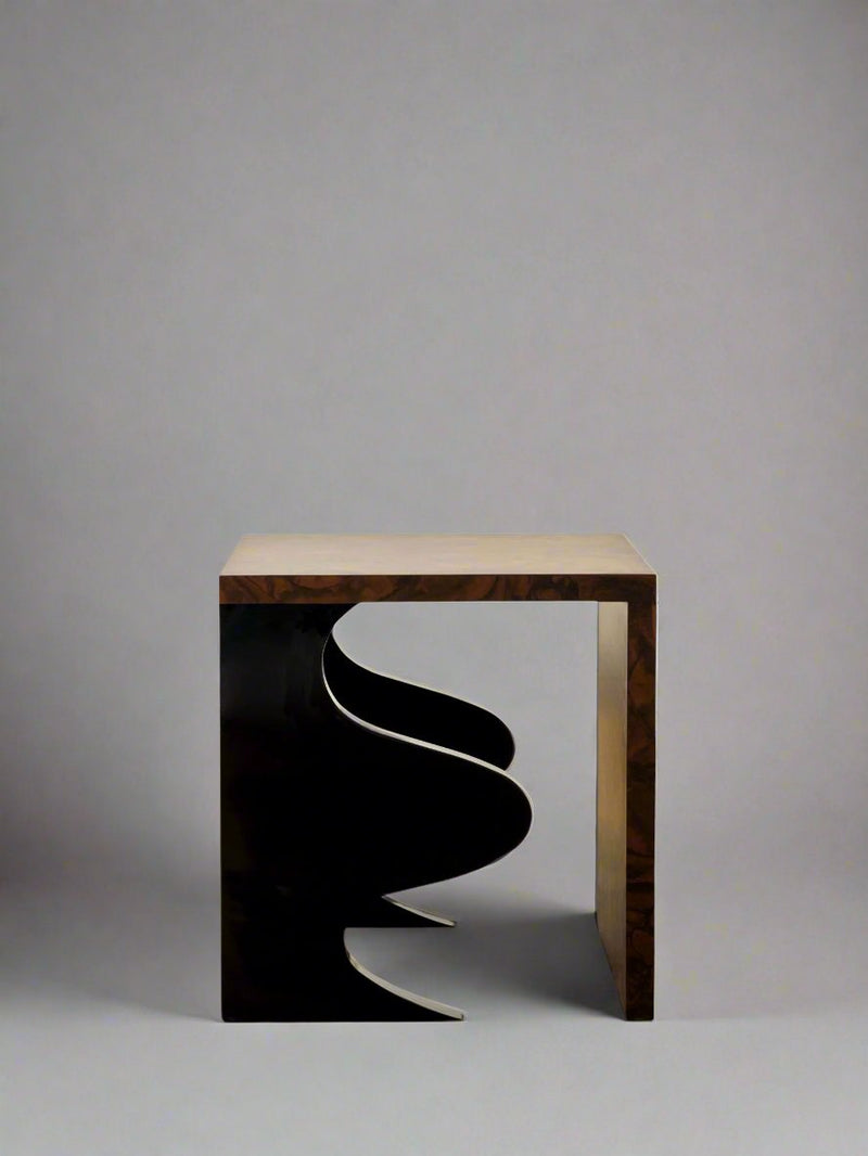 Harlequin walnut side table with curved black sculptural element