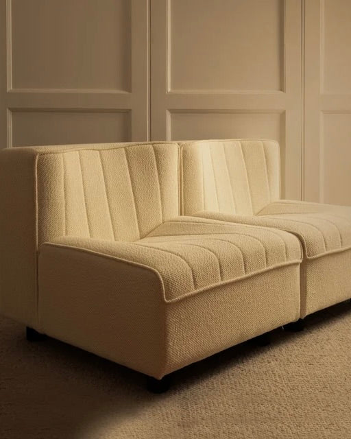 Tito Agnoli lounge chairs - Italy 1970s — angled view in neutral-toned room