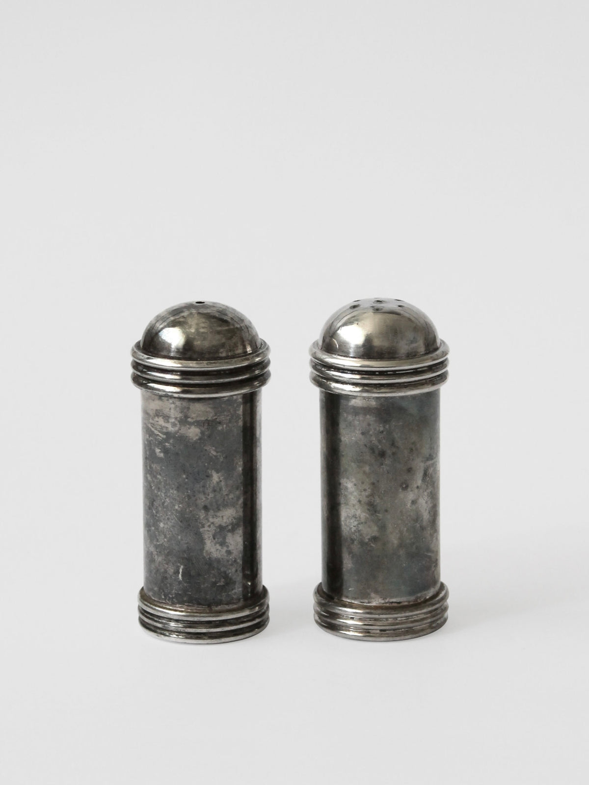 Vintage silver plated salt and pepper shakers with ribbed bands