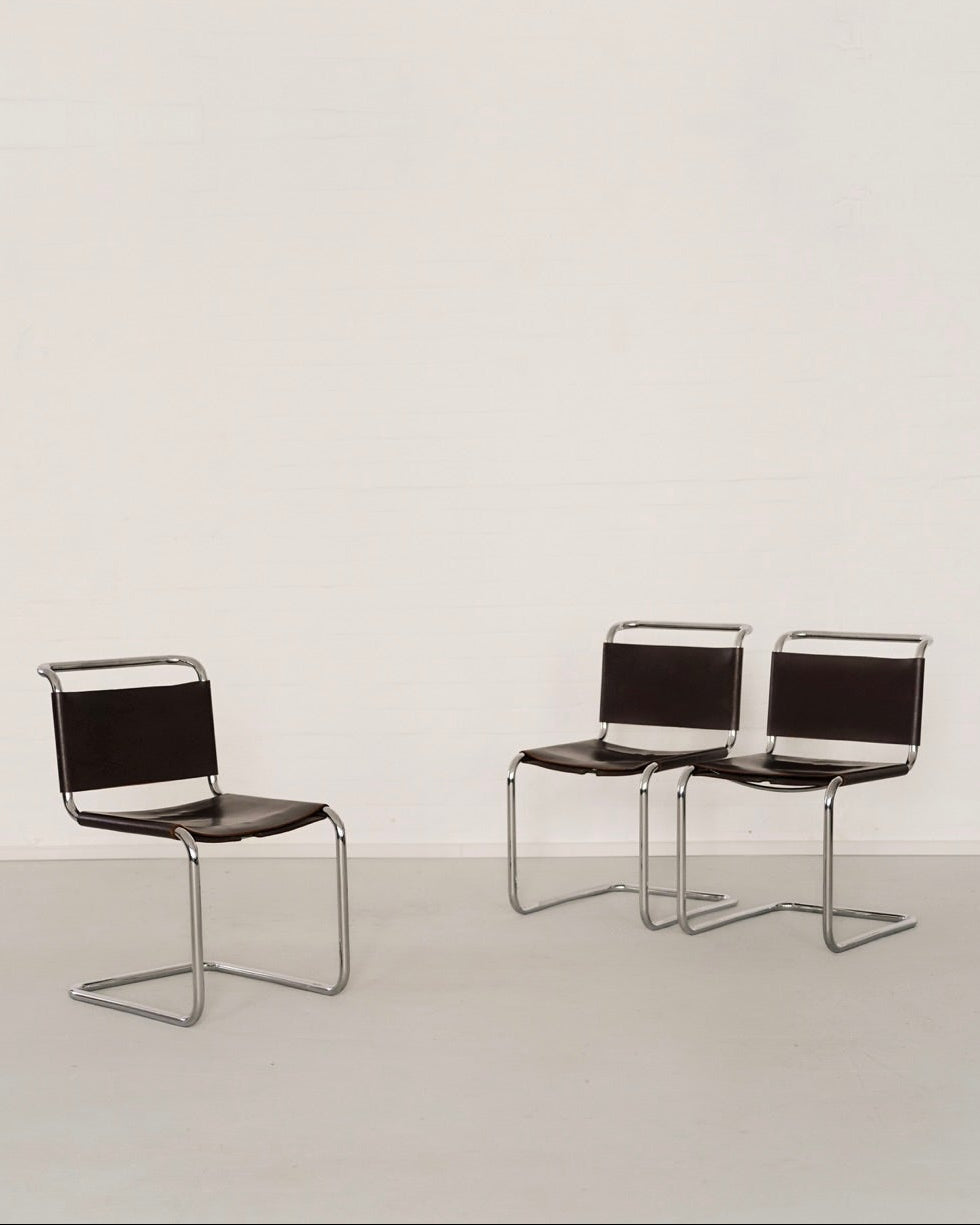 Three black leather B33 cantilever chairs by Marcel Breuer