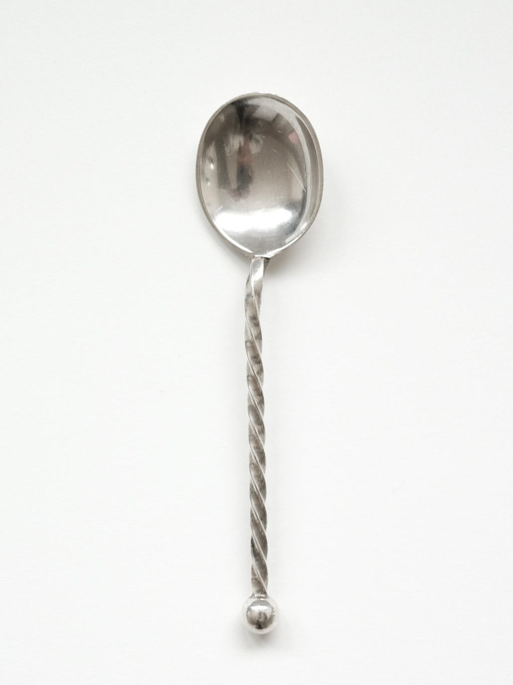 Silver-plated spoon with twisted handle and decorative ball finial