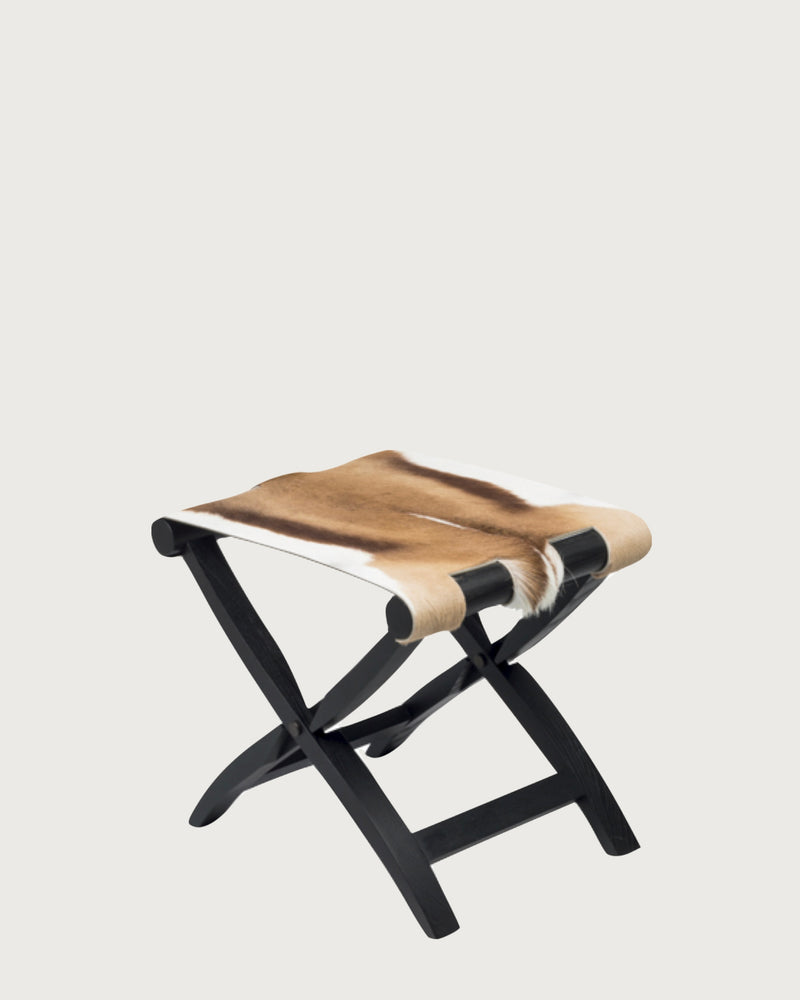 Arturo folding stool with antelope hide seat and black wooden frame