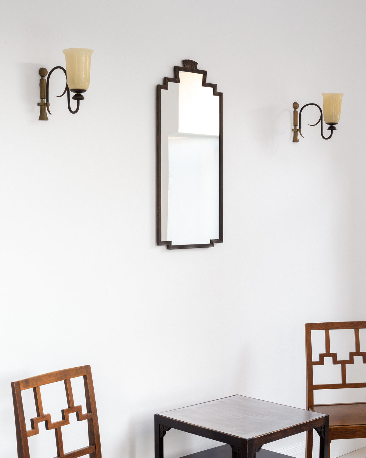 1930s Swedish Art Deco bronze mirror in elegant dining room setting