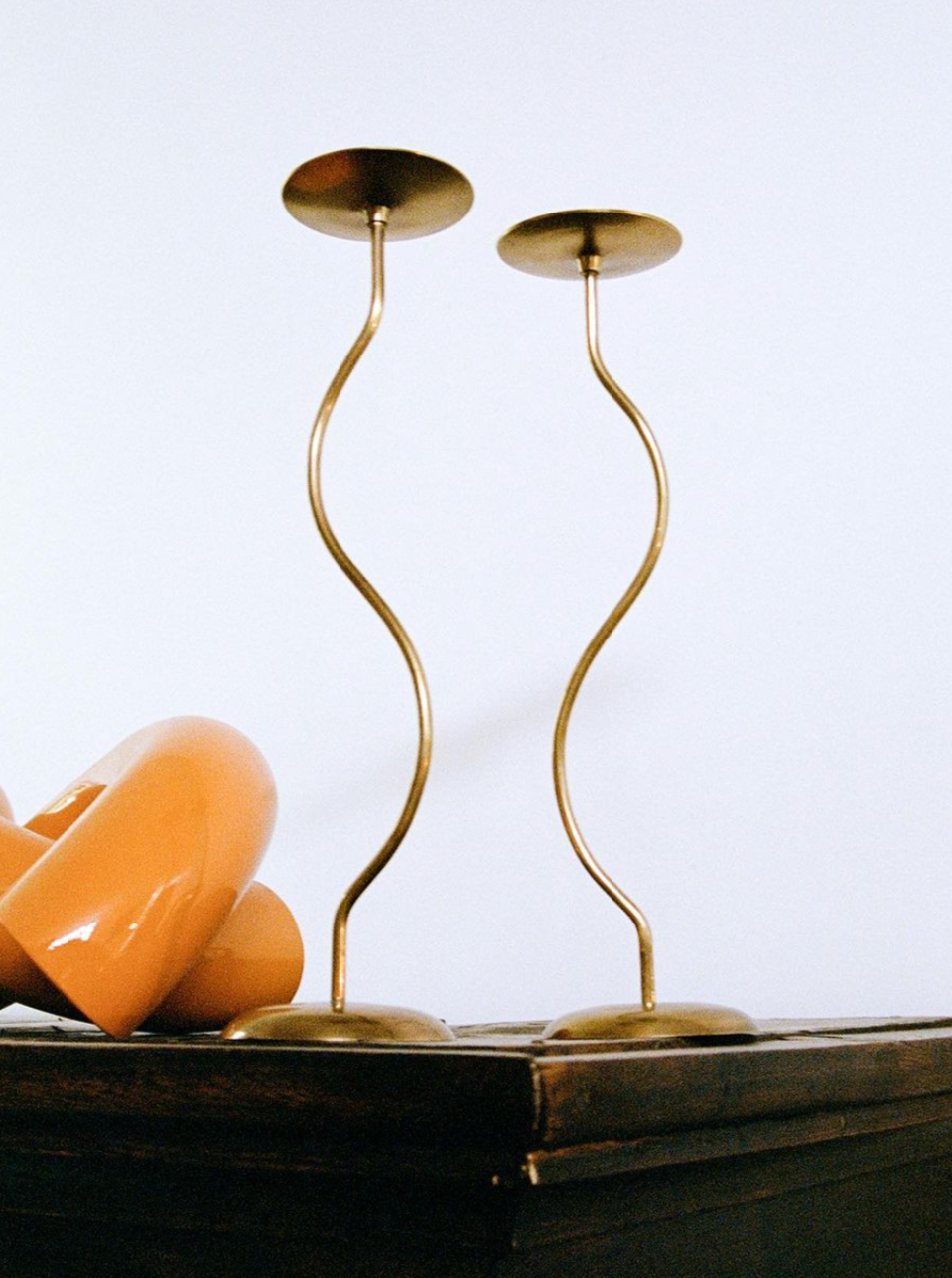 Handcrafted brass dancing duo figurines with intricate detailing and polished finish