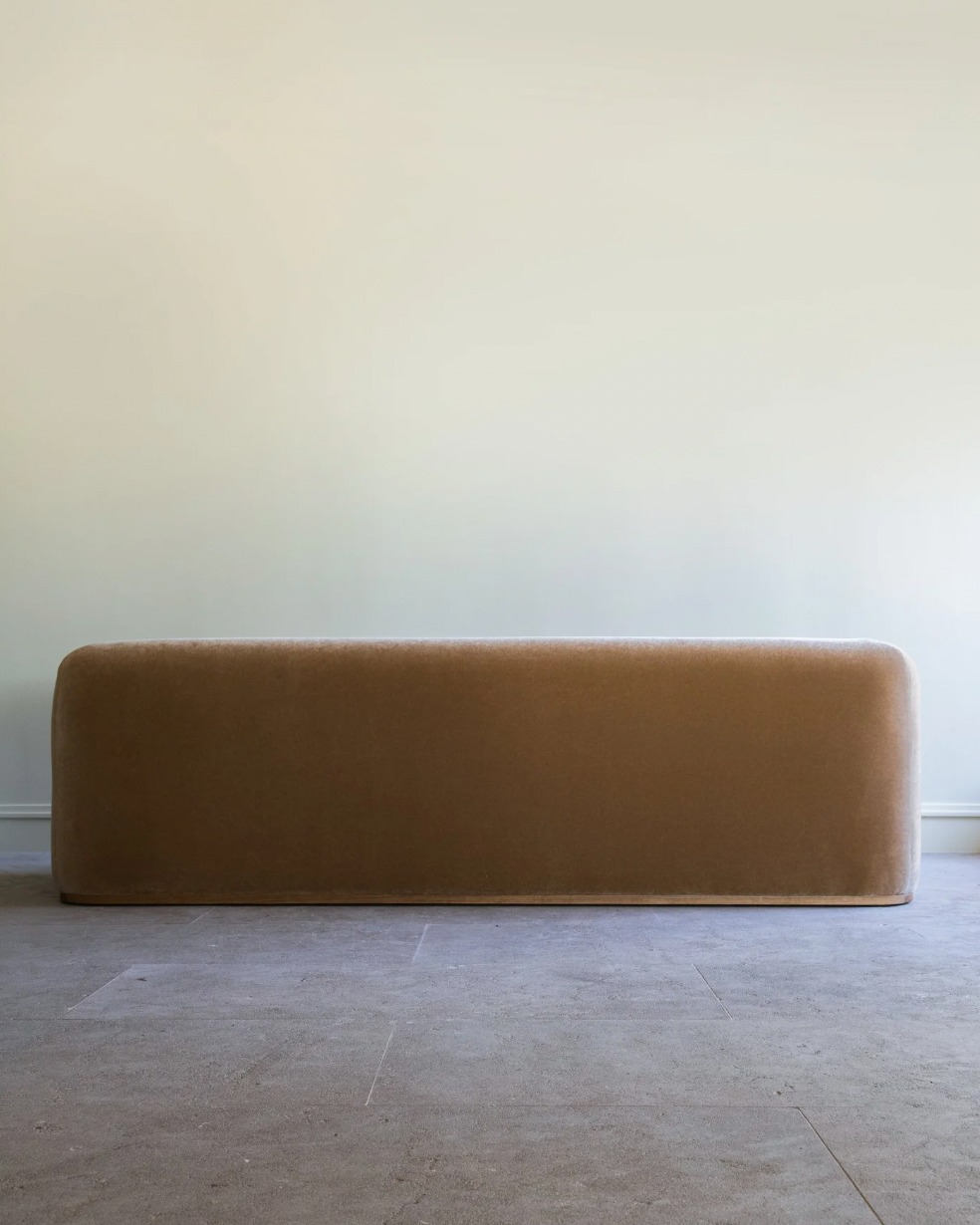 Quincy brown velvet sofa by Studio OSKLO front view