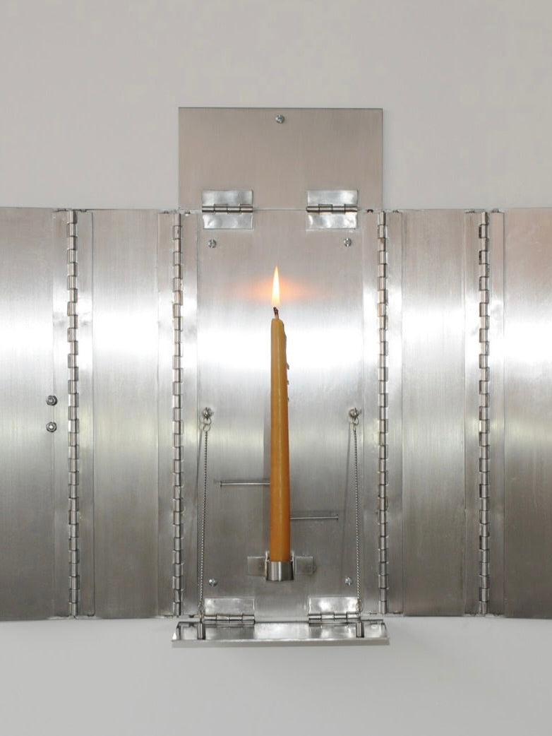 Wax Clock' Wall Candleholder — front view with candle in modern metal finish