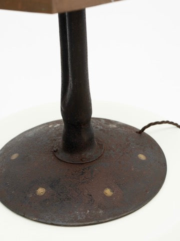 Heavy metal base detail of brutalist tole table lamp