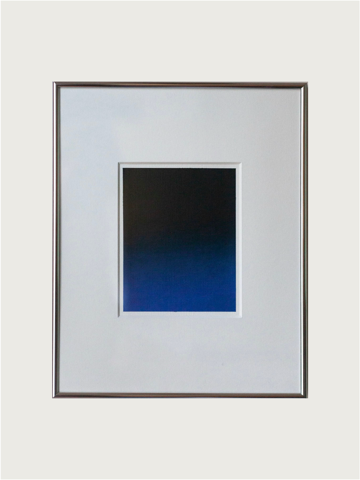 The "Untitled, 2024" painting by Rebecca von Matérn showcases a framed abstract artwork with a gradient square shifting from deep black to vibrant blue, centered within a white mat and bordered by a thin aluminum frame. This art print exudes elegance while displayed against a simple light-colored wall.