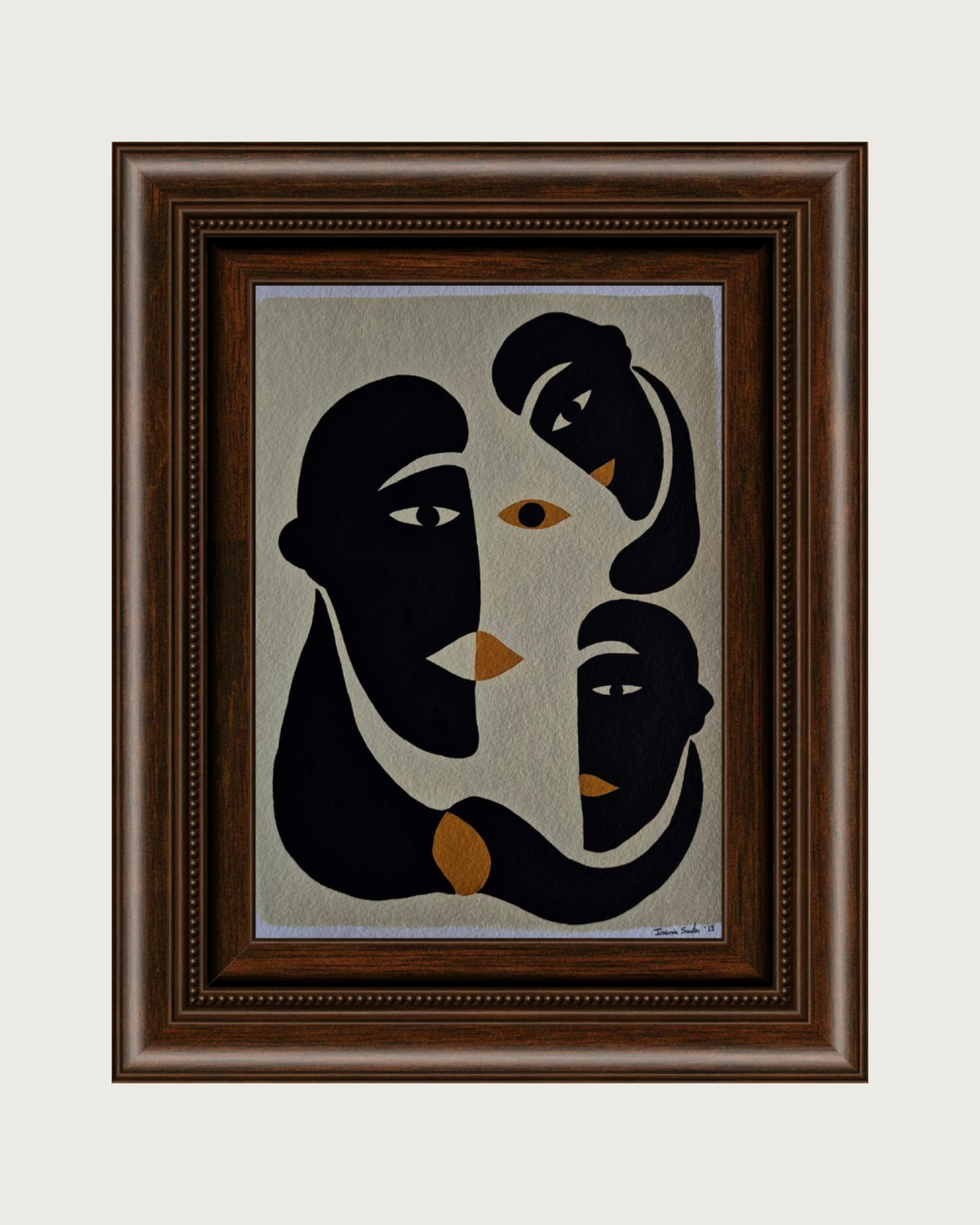 Abstract painting of three overlapping faces in black and gold by Ivânia