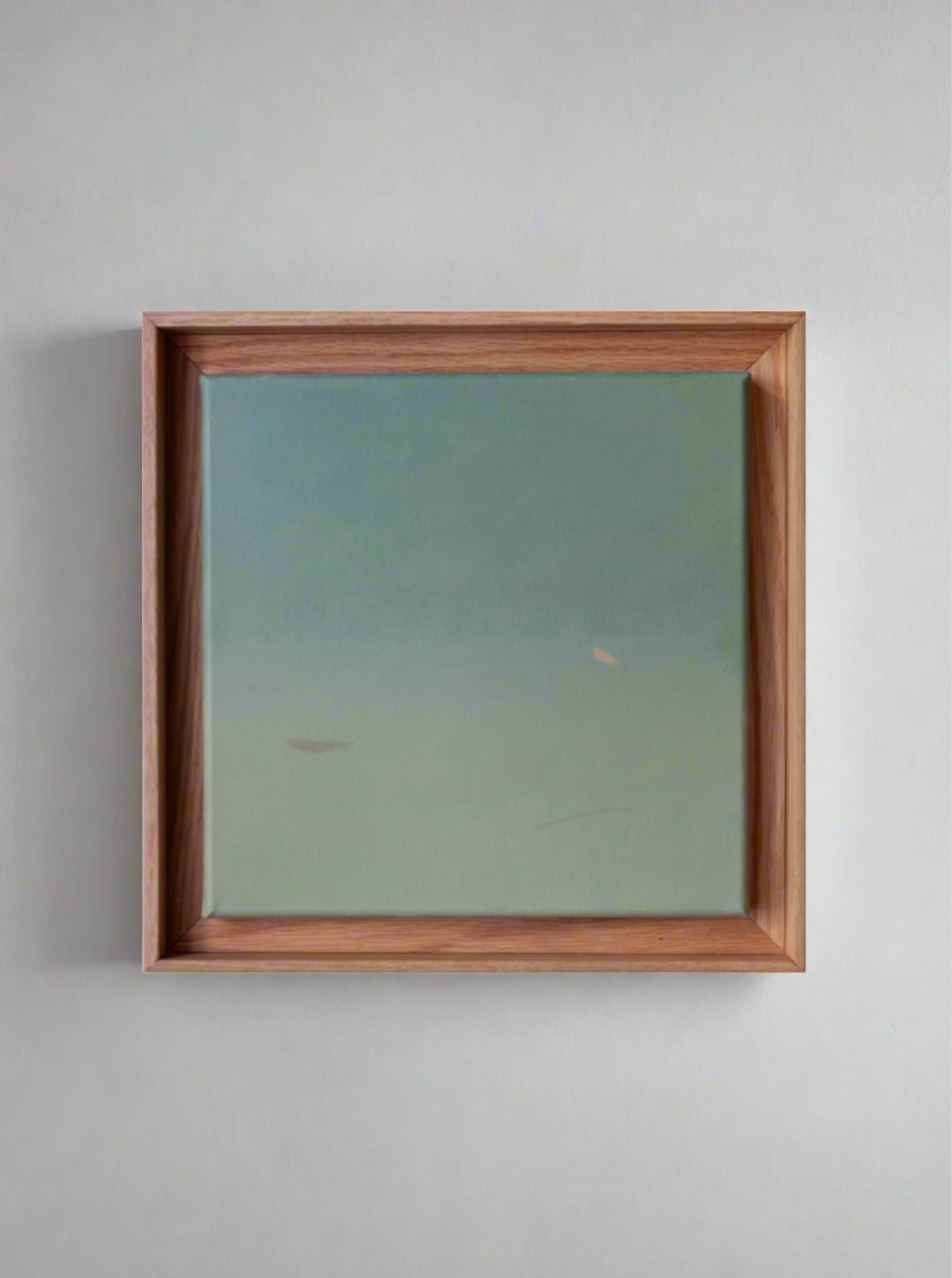 An Untitled, painting, 2024 by Rebecca von Matérn features a gradient from light to darker green, suggesting an abstract landscape or seascape. The shadow frame, made of hand-waxed oak, is simple and unadorned, emphasizing the serene and understated quality of the artwork.