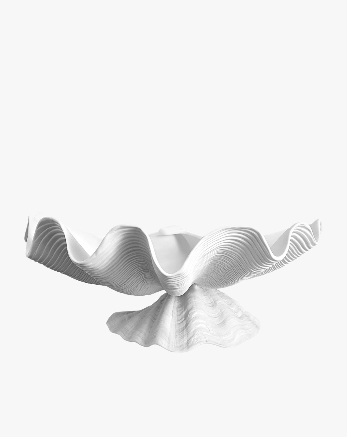 Abstract fine porcelain sculpture resembling a flowing, wavy fabric, centered on a minimalistic, solid base against a plain white background by LOBJET.
