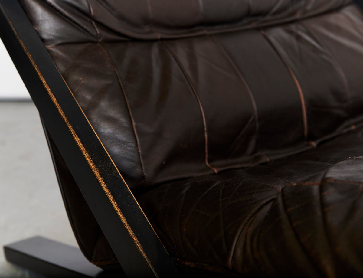 Dark brown leather upholstery detail of DS80 lounge chair
