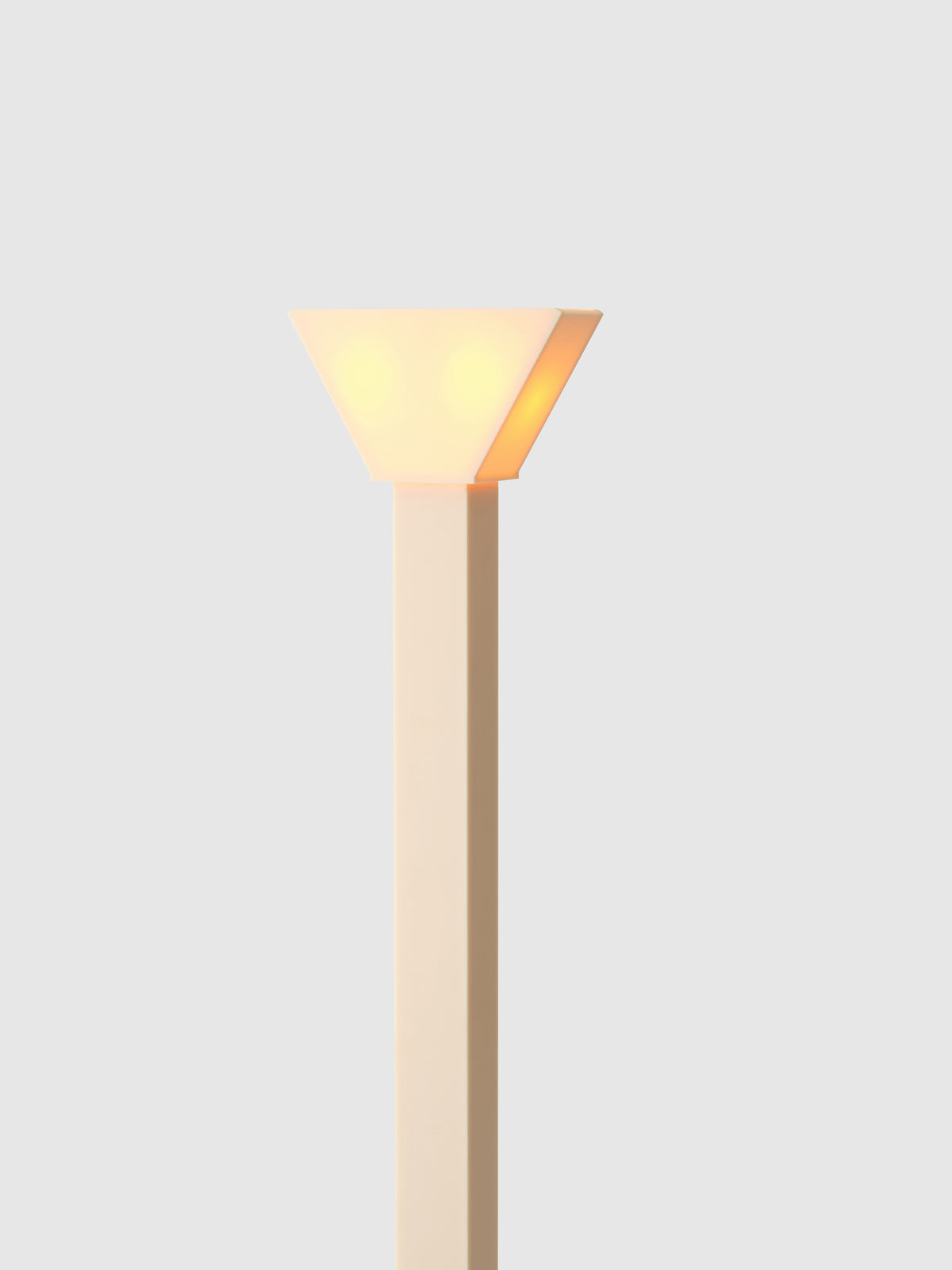 Modern beige floor lamp with illuminated triangular shade detail