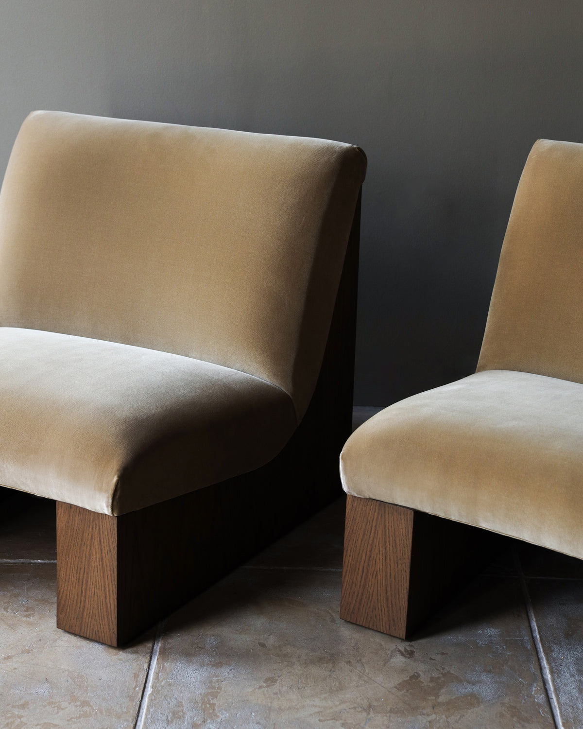 Doheny upholstered lounge chairs with oak legs detail view