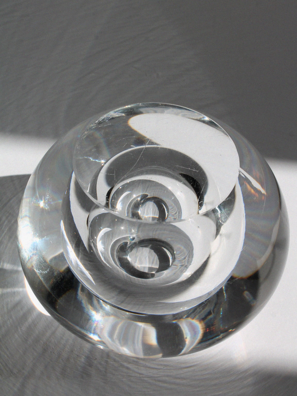 Clear crystal vase with spiral interior design by Timo Sarpaneva