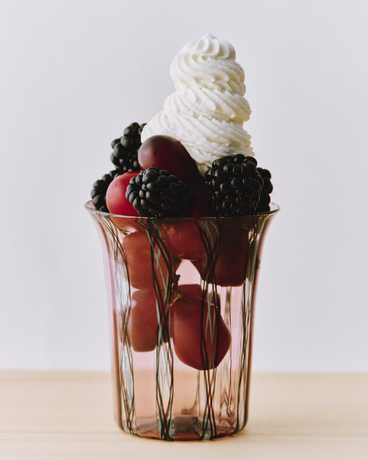 Clara Glasses - Set of four — side view with fruit and whipped cream