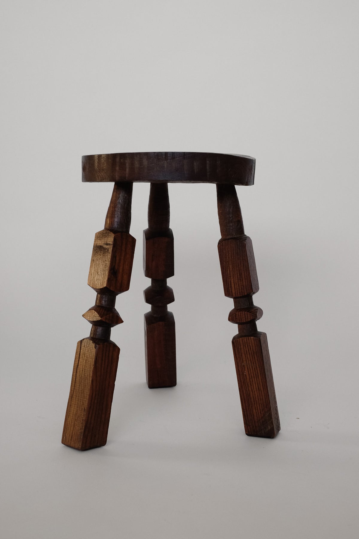 Pair of Mid-Century Rustic Tripod Stools — side angle