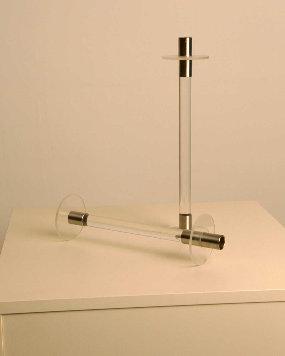 Lucite and silver candlesticks detail showing transparent acrylic tubes