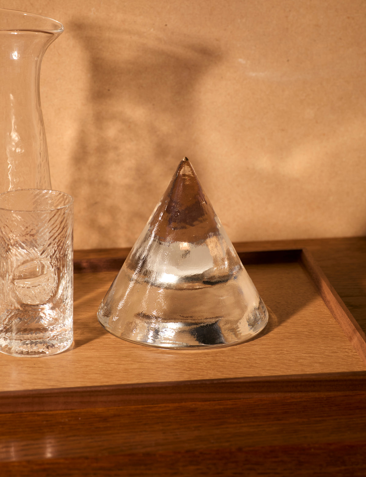 Clear glass pyramid candle holder in European glass  — lifestyle setting