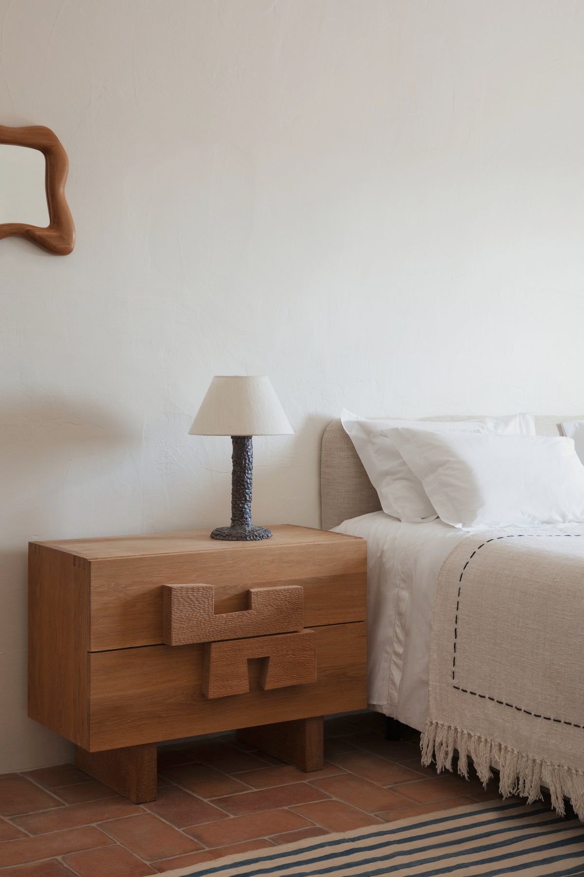 Casa Bedside Light — positioned on wooden nightstand in bedroom