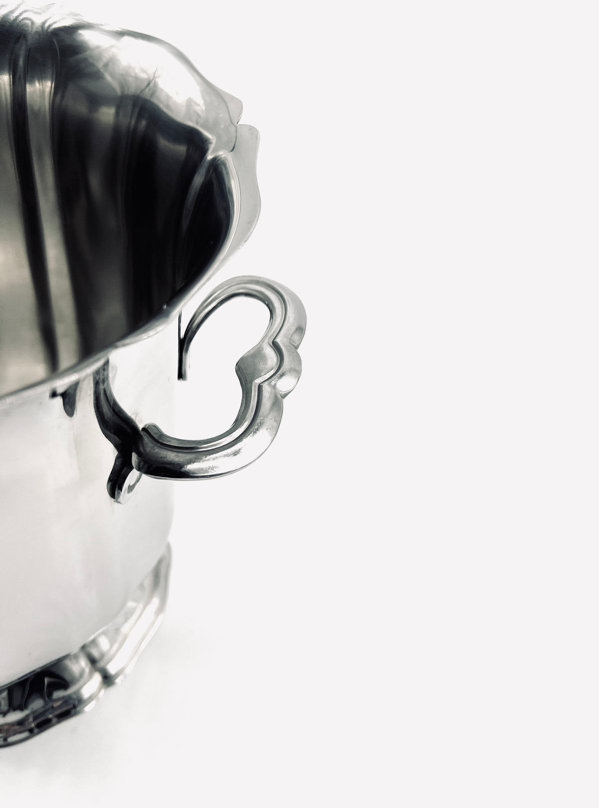Handle detail of vintage stainless steel champagne cooler
