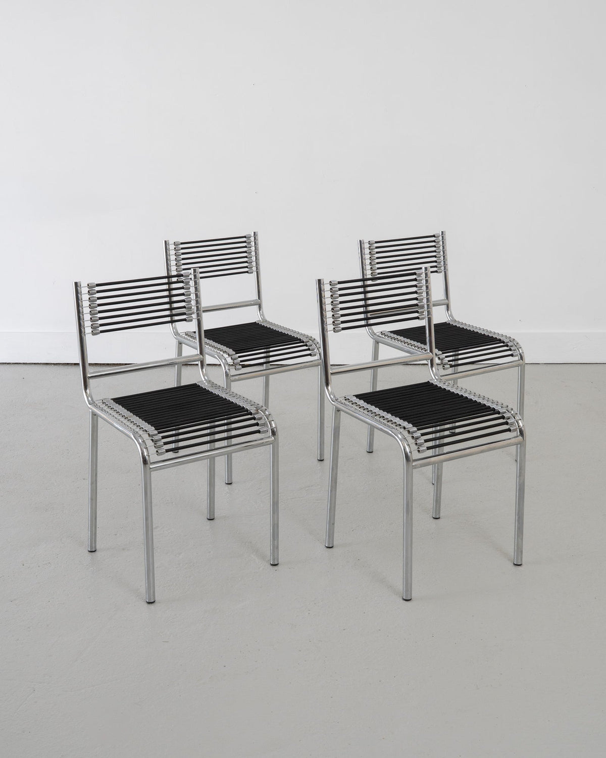 Four Sandows Chairs by René Herbst, c.1980 by Tom Bogle | The Oblist
