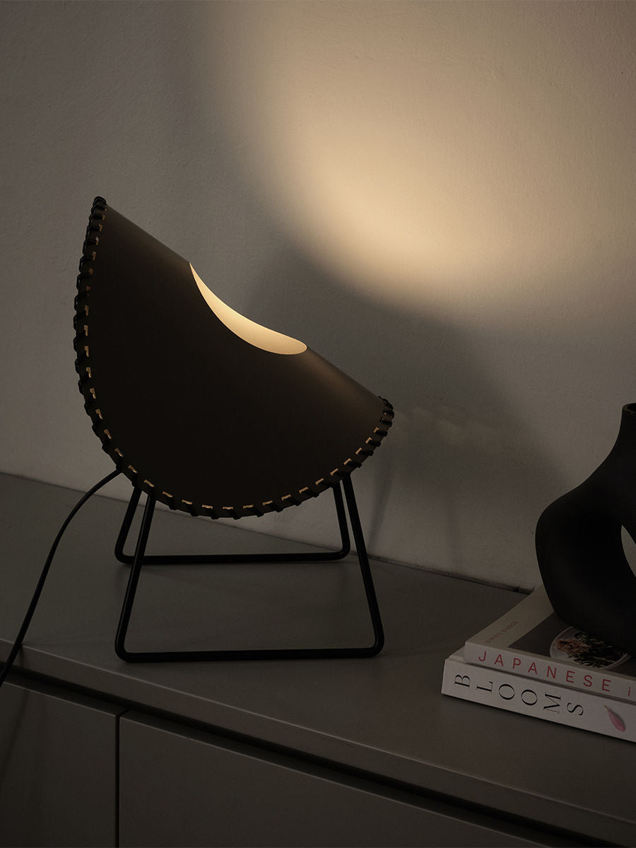 Zero' Floor Lamp — side view highlighting black leather and metal base