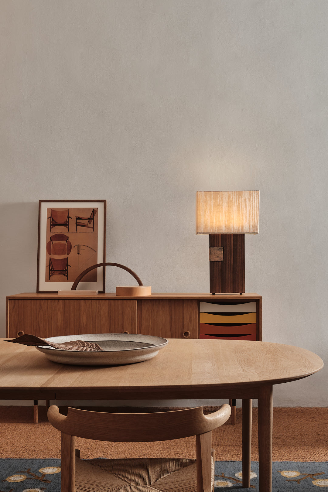 Esperia table lamp with fabric shade in modern dining room setting
