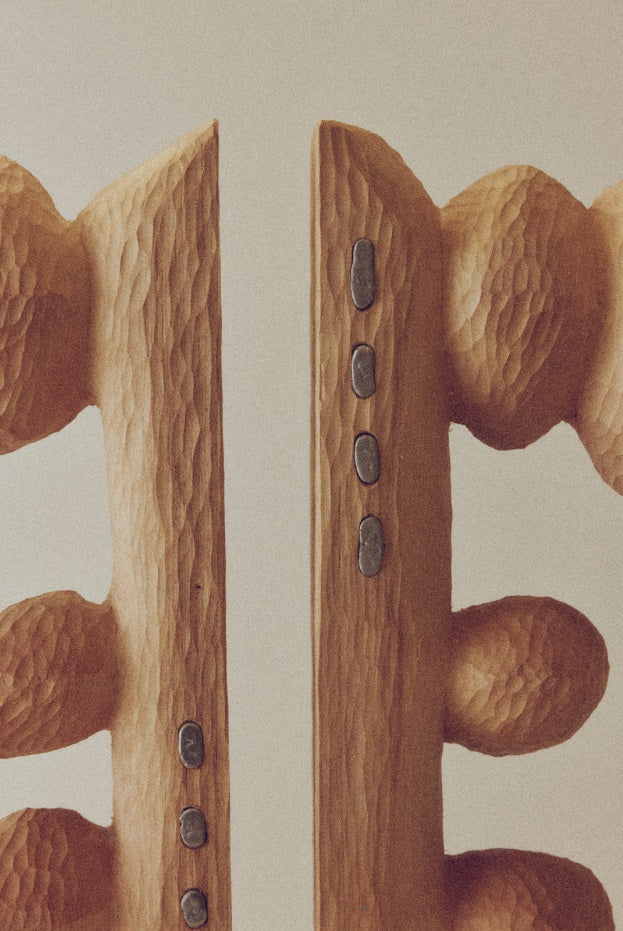 Close-up of hand-carved wood sculpture joint with metal inlays, Étude 31 by Karim Charlebois