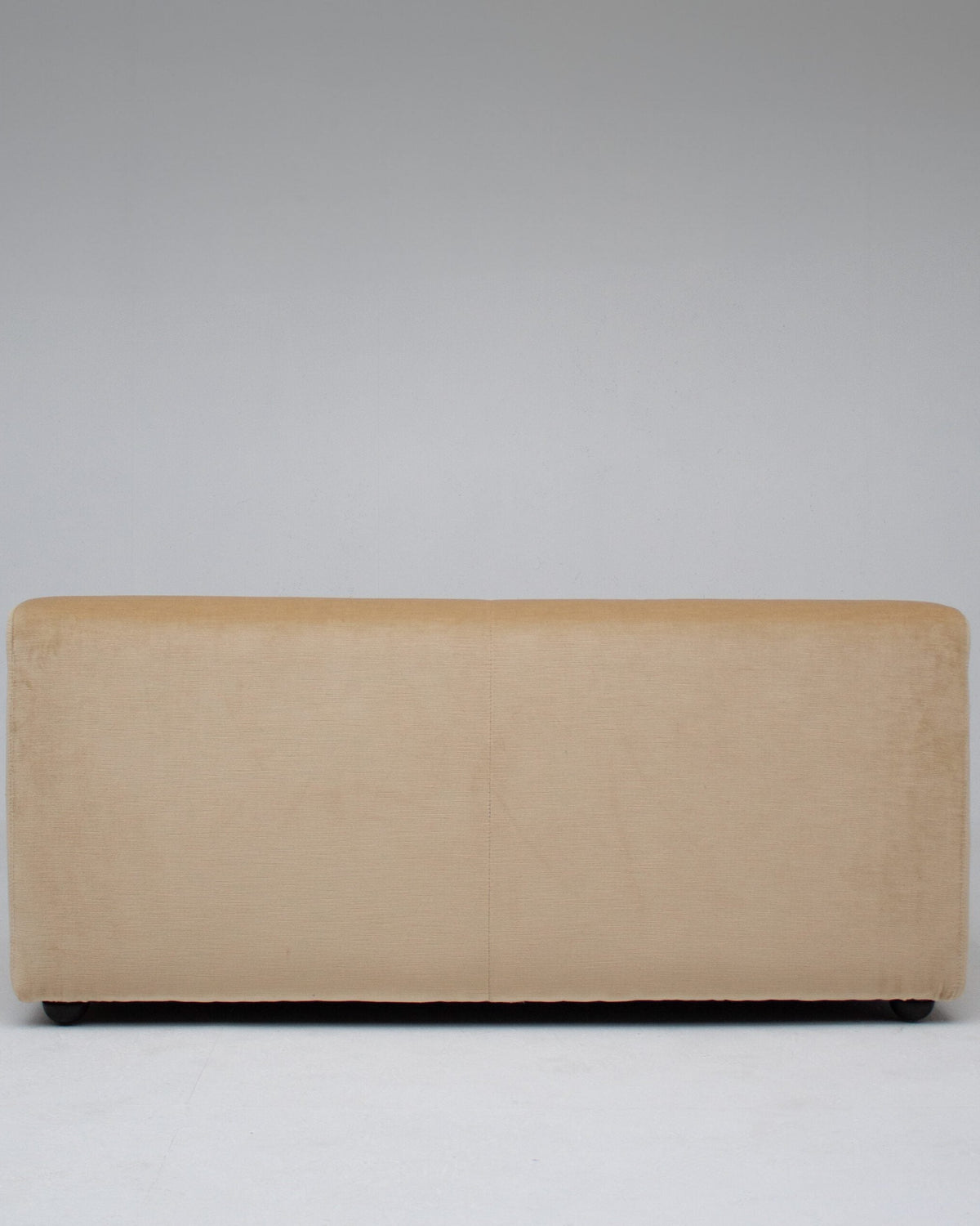 Sofa by Gigi Radice in beige velvet — back view highlighting soft texture