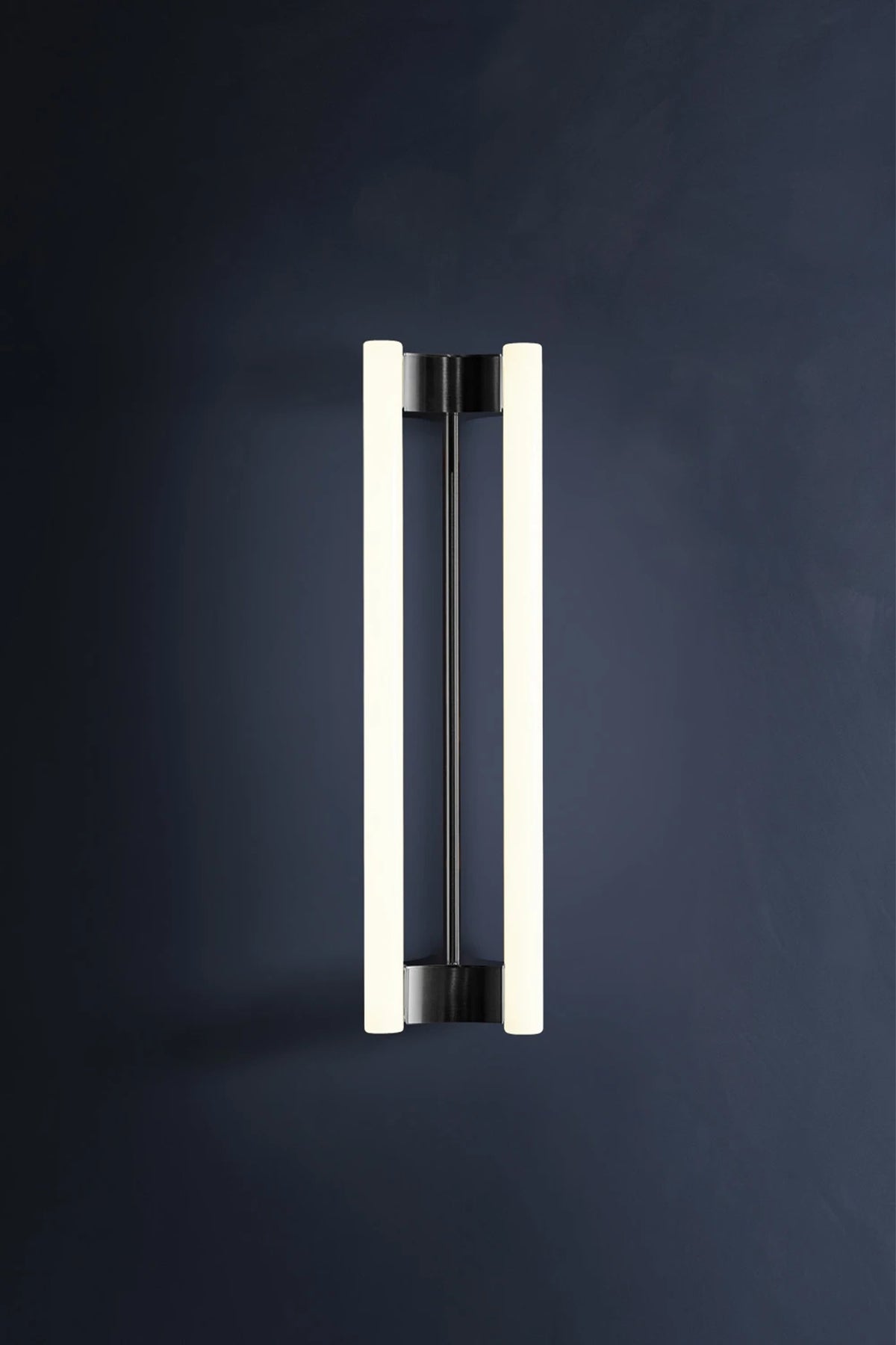LIA WALL SCONCE 50 — side angle showing modern black and white design
