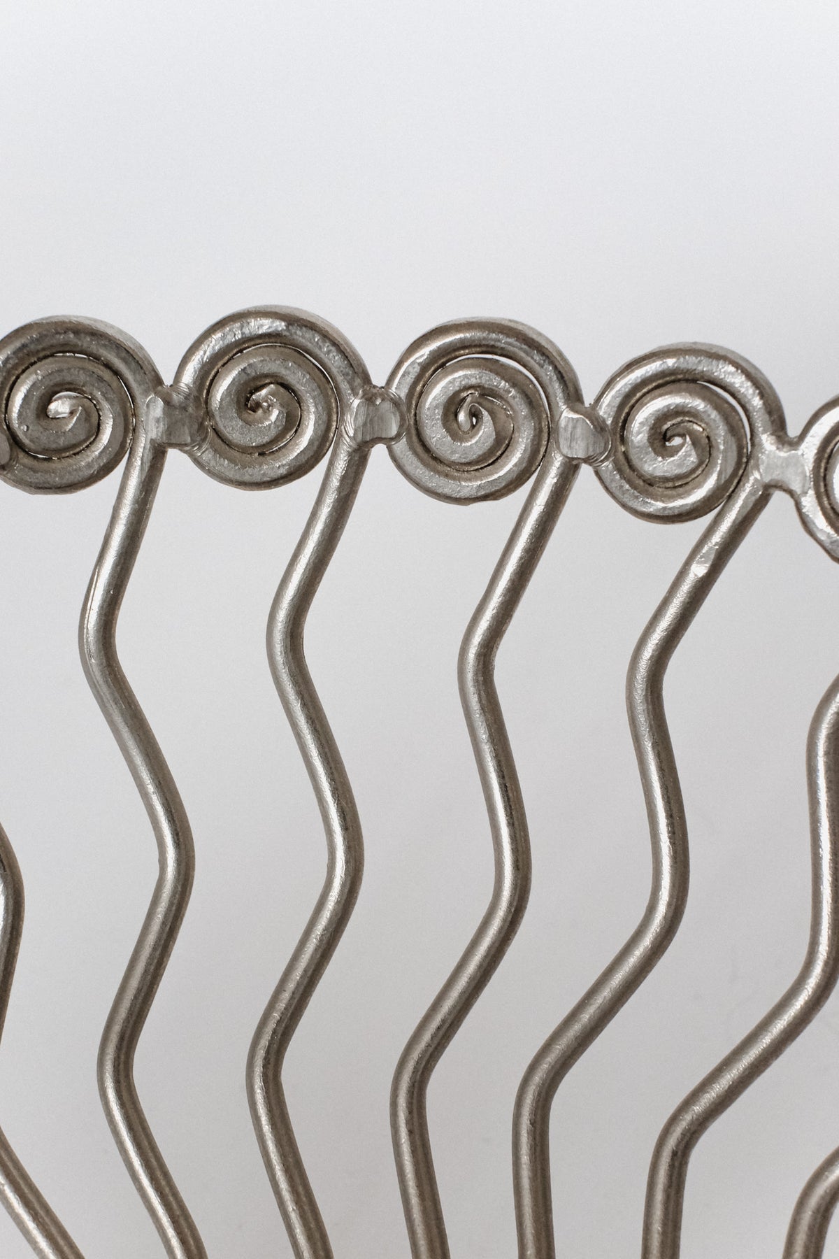 Large Decorative Bowl — side angle showing metal spiral design