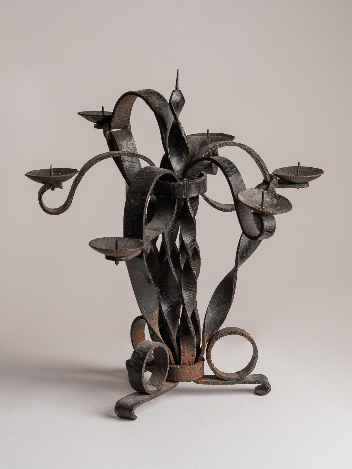 Vintage Folk Art Hand-Forged Wrought Iron Candelabra — close-up of black iron design