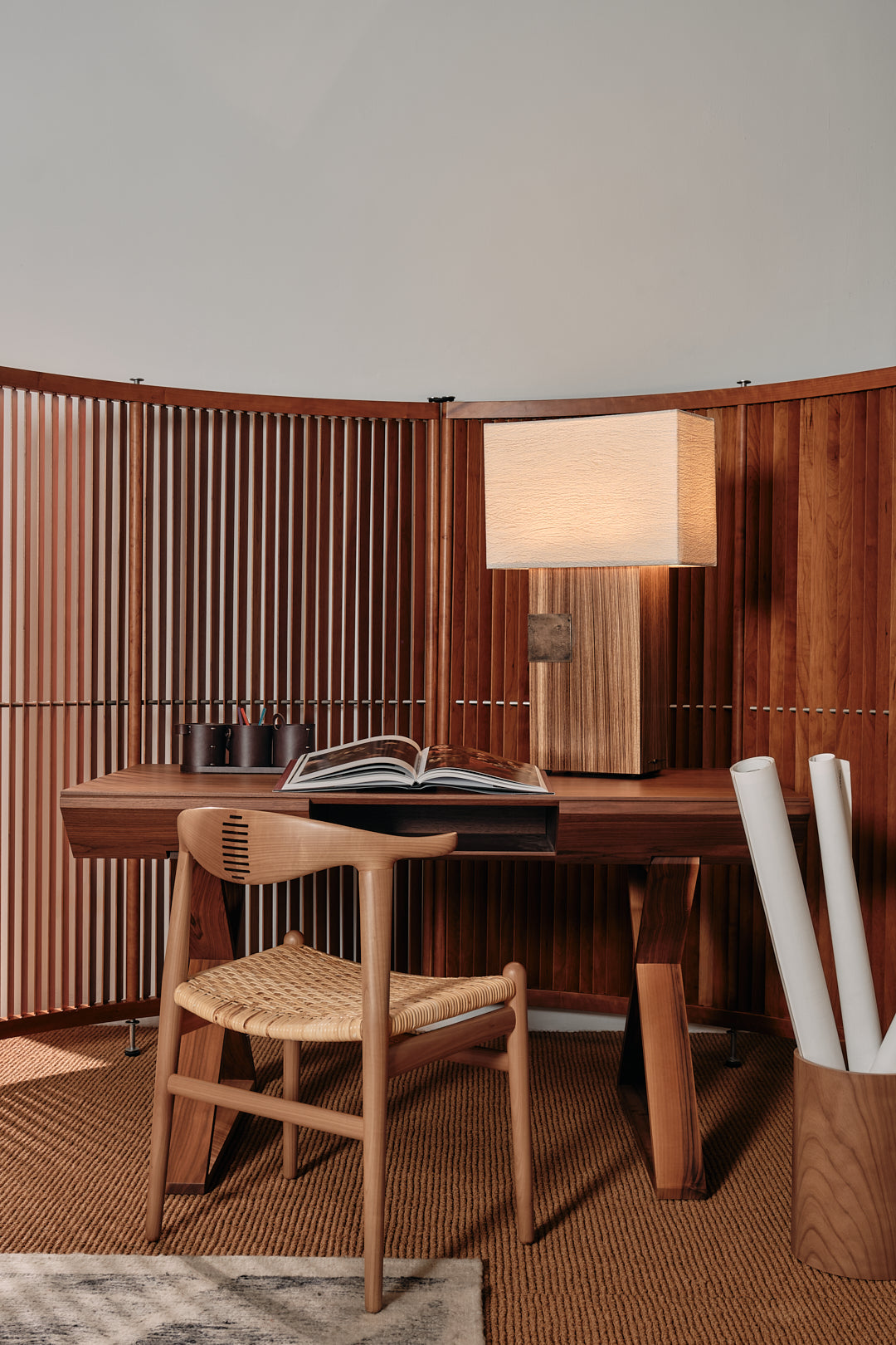 Pollux table lamp in warm home office with wood furniture