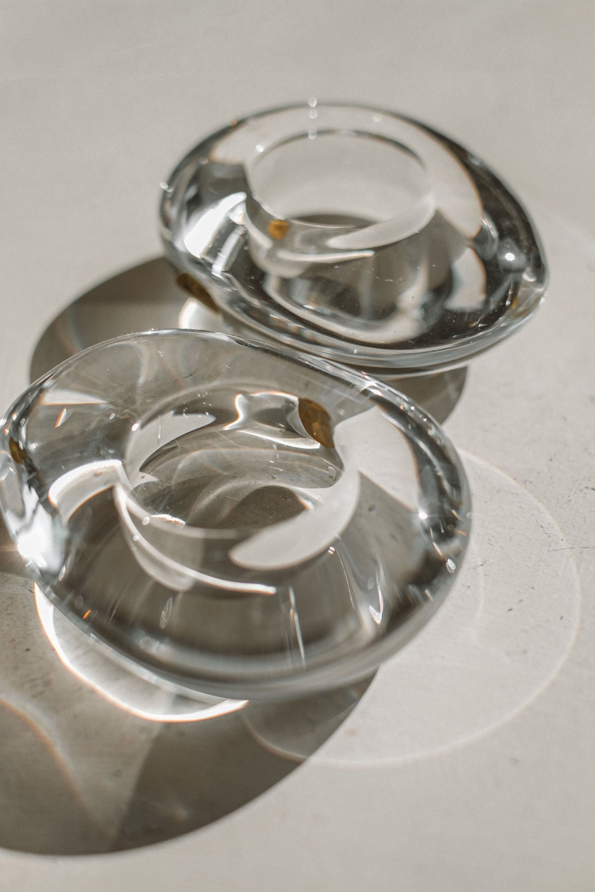 Clear crystal candleholders detail showing geometric cut patterns