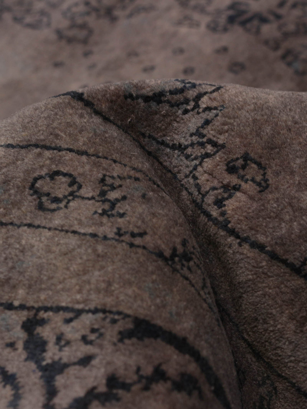 overdyed rug in mulberry 241 x 307 cm — detail view