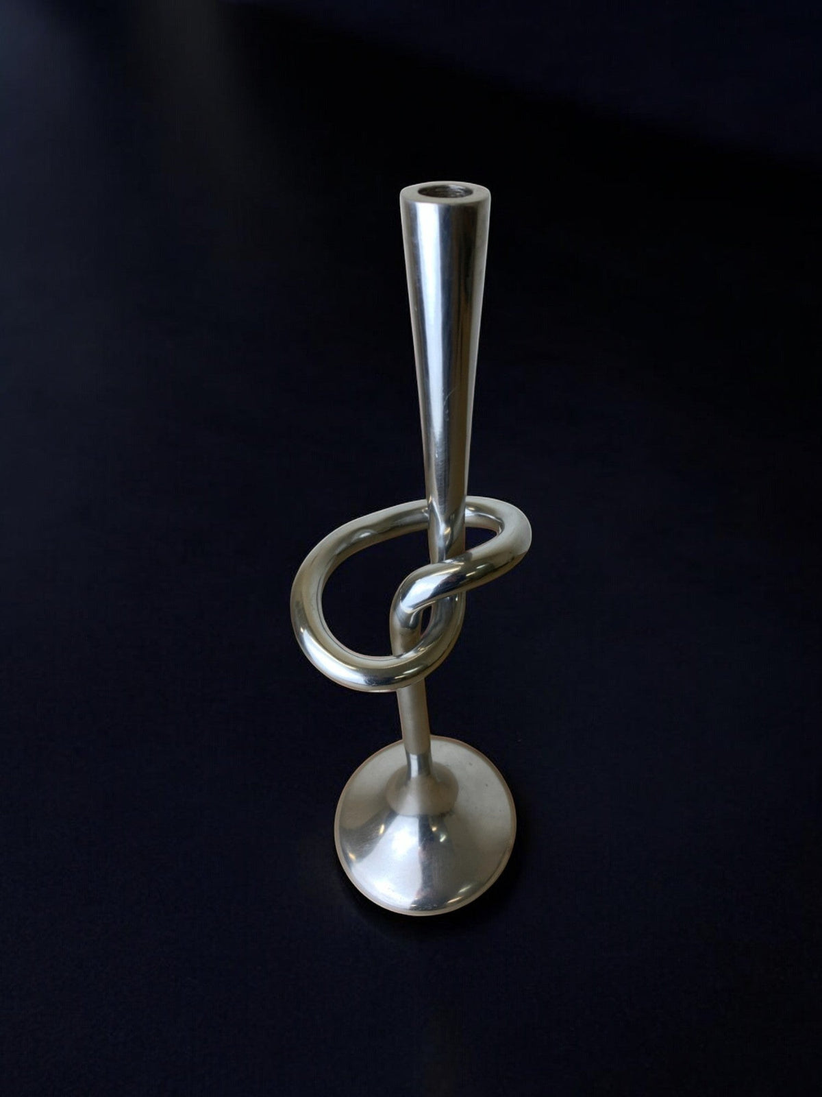 XL knotted candlestick in Solid aluminum, Italy, 1980's — side angle