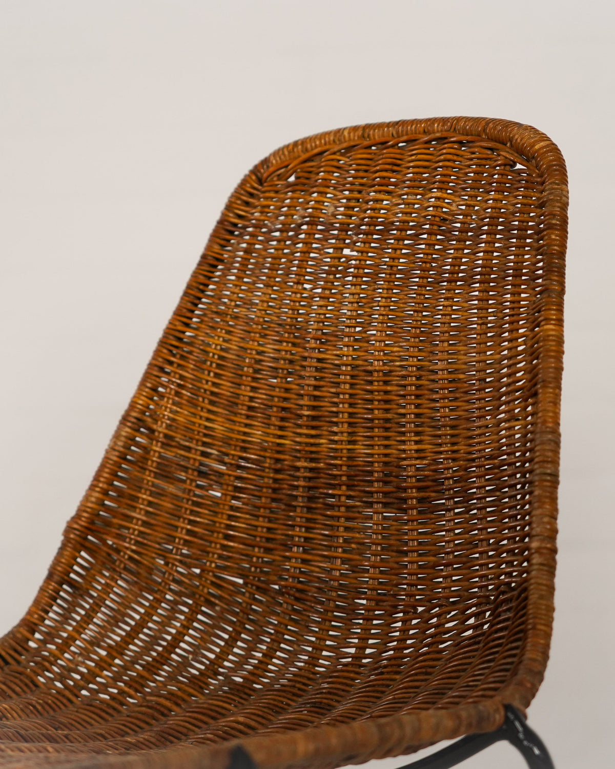 Woven rattan backrest detail of Basket chair by Gian Franco Legler