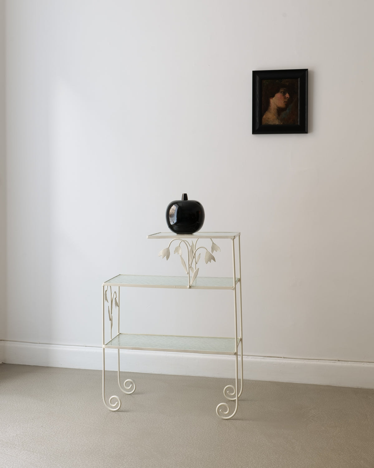 Black ceramic apple vase by Gösta Grähs styled on vintage stand