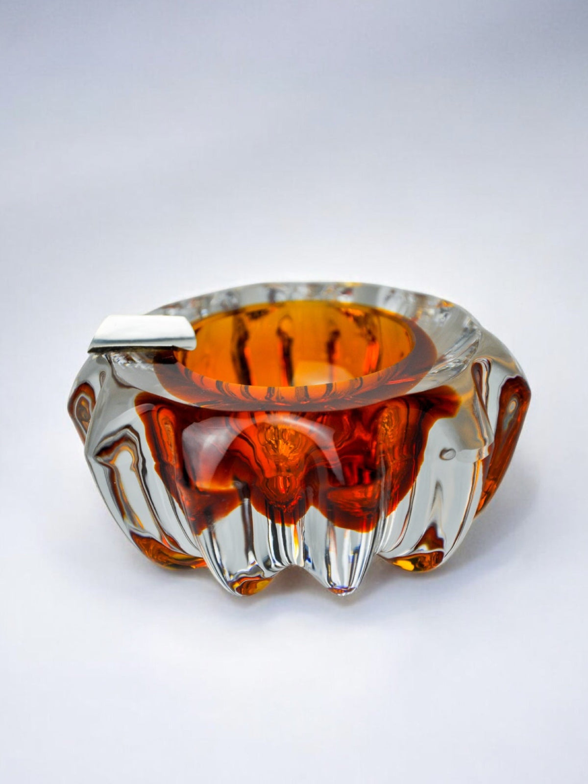 Orange Sommerso ashtray by Seguso, Murano glass & silver support, Italy, 1970 — lifestyle setting