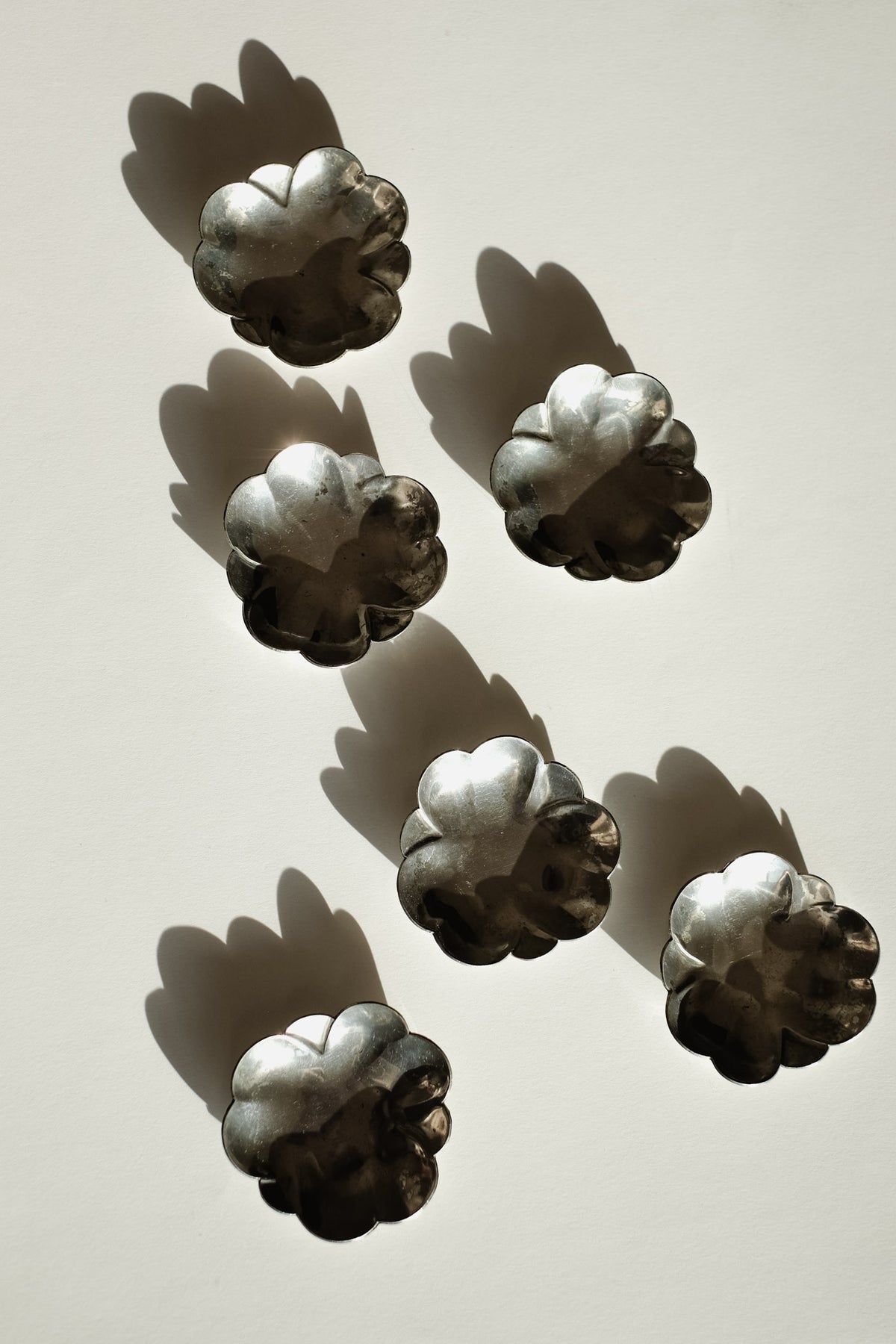 Set of 6 Small Dishes — overhead view on light background